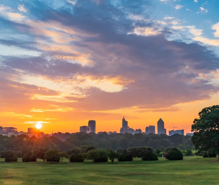 Cityscape sunset over the park