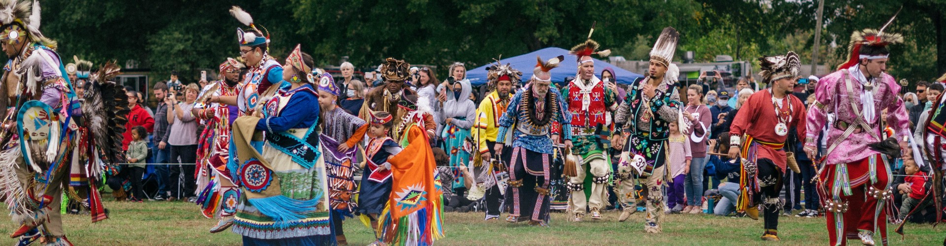 Dancers in the arena at the Inaugural Dix Park Inter Tribal Pow Wow 2021