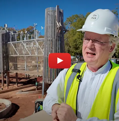 Man speaking about Gipson Play Plaza