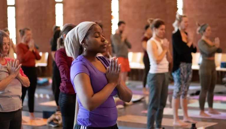 Adults in yoga poses
