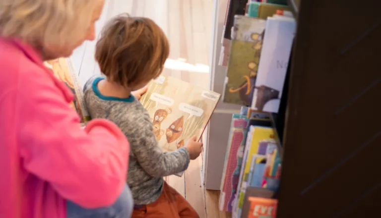Kid and a book