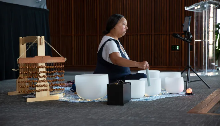 woman with sound bowls