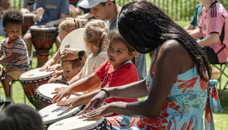 kids and adults drumming