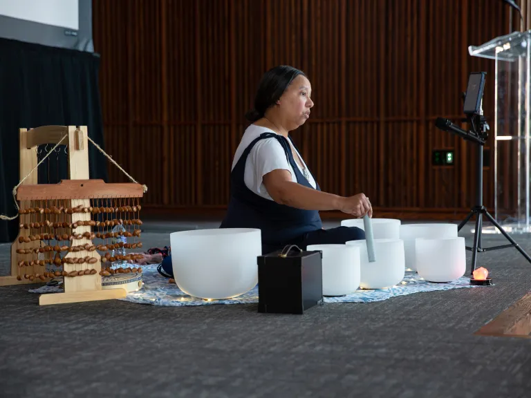 woman with sound bowls