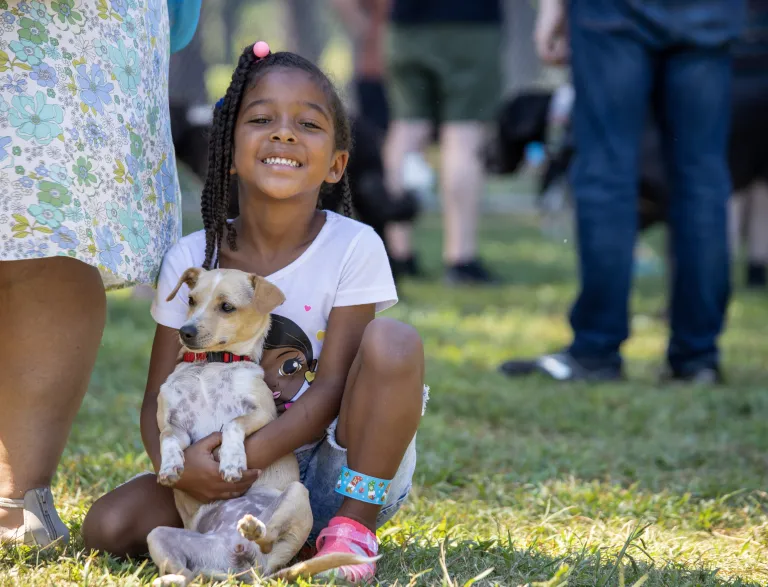 Child with small dog